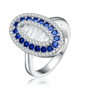 Coralie Oval Sapphire Blue Halo Ring