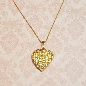 Criss Cross Golden Love Heart Locket